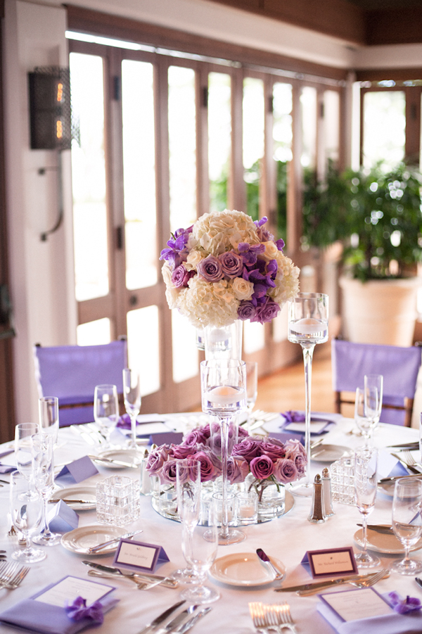 lavender and purple table setting with floral centerpiece - Honolulu destination wedding photo by top Hawaiian wedding photographer Derek Wong